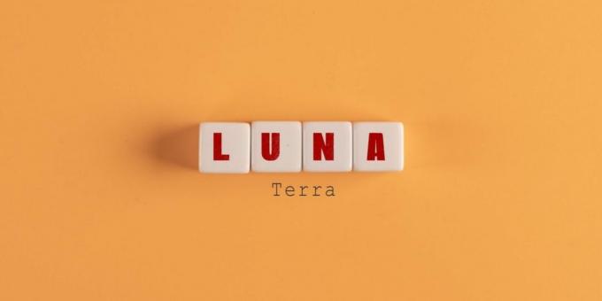 Luna in Buchstabenblöcken auf orangefarbenem Hintergrund geschrieben